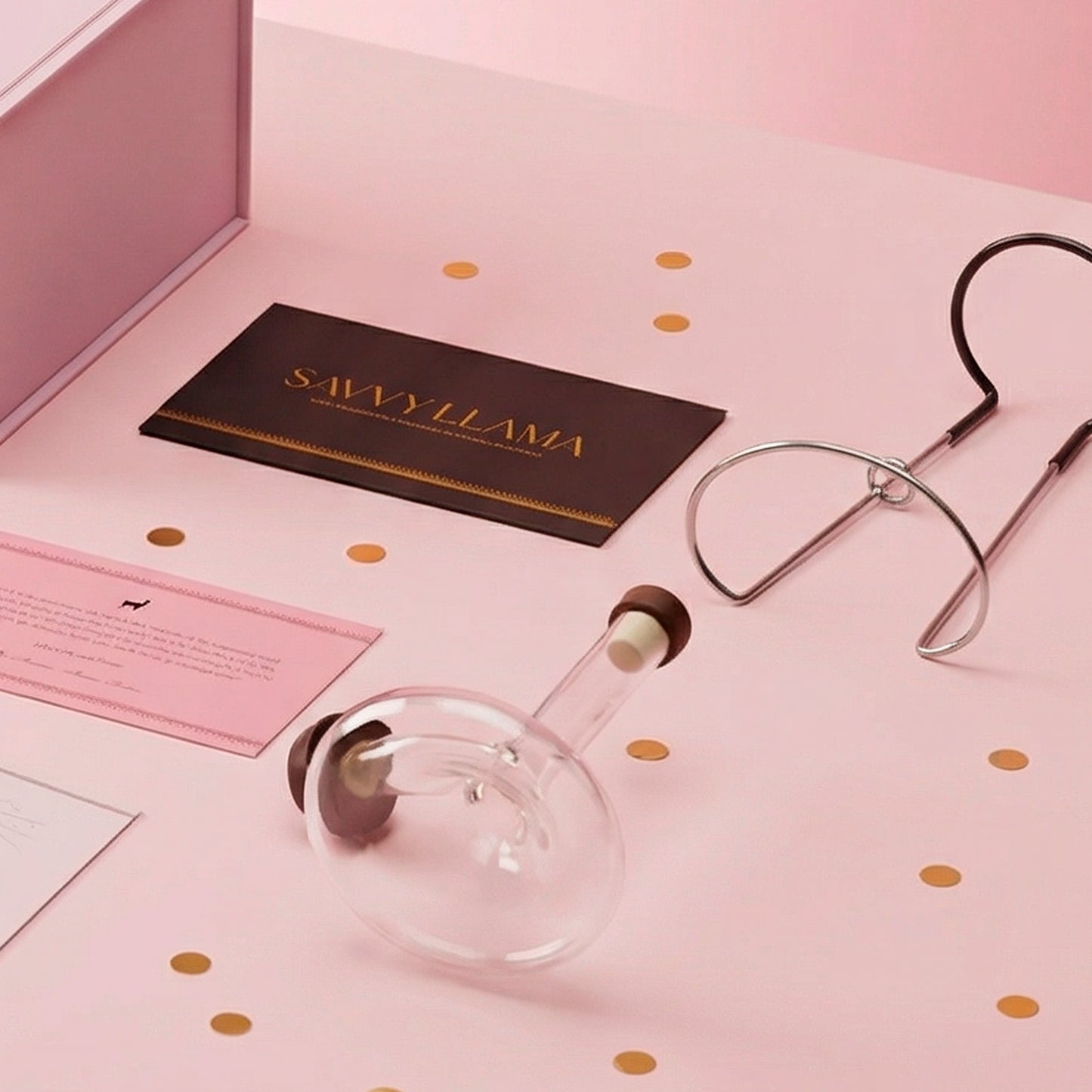 The hand-blown mini decanter from the Savvy Llama wine decanting kit, designed to sit on the bottle and aerate wine as it pours for an effortless at-home wine serving ritual