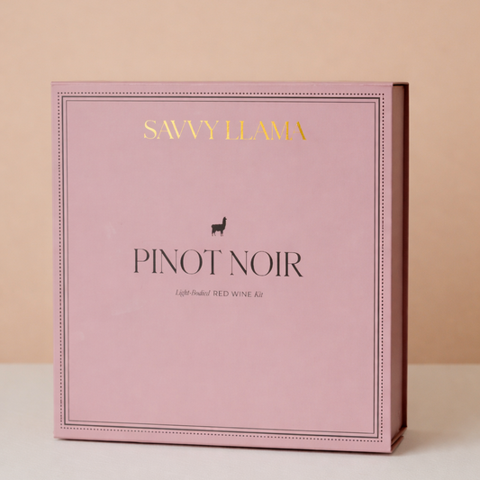 Savvy Llama Pinot Noir wine tasting kit displayed on a styled studio background, showing the guided light-bodied red wine tasting tools for women discovering pinot noir at home