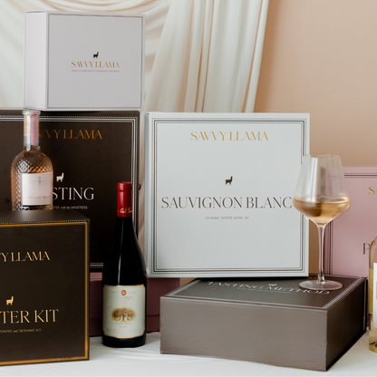 All eight kits of the Savvy Llama Wine Confidence Program displayed together, the complete guided wine confidence membership for women delivering eight kits over ten months