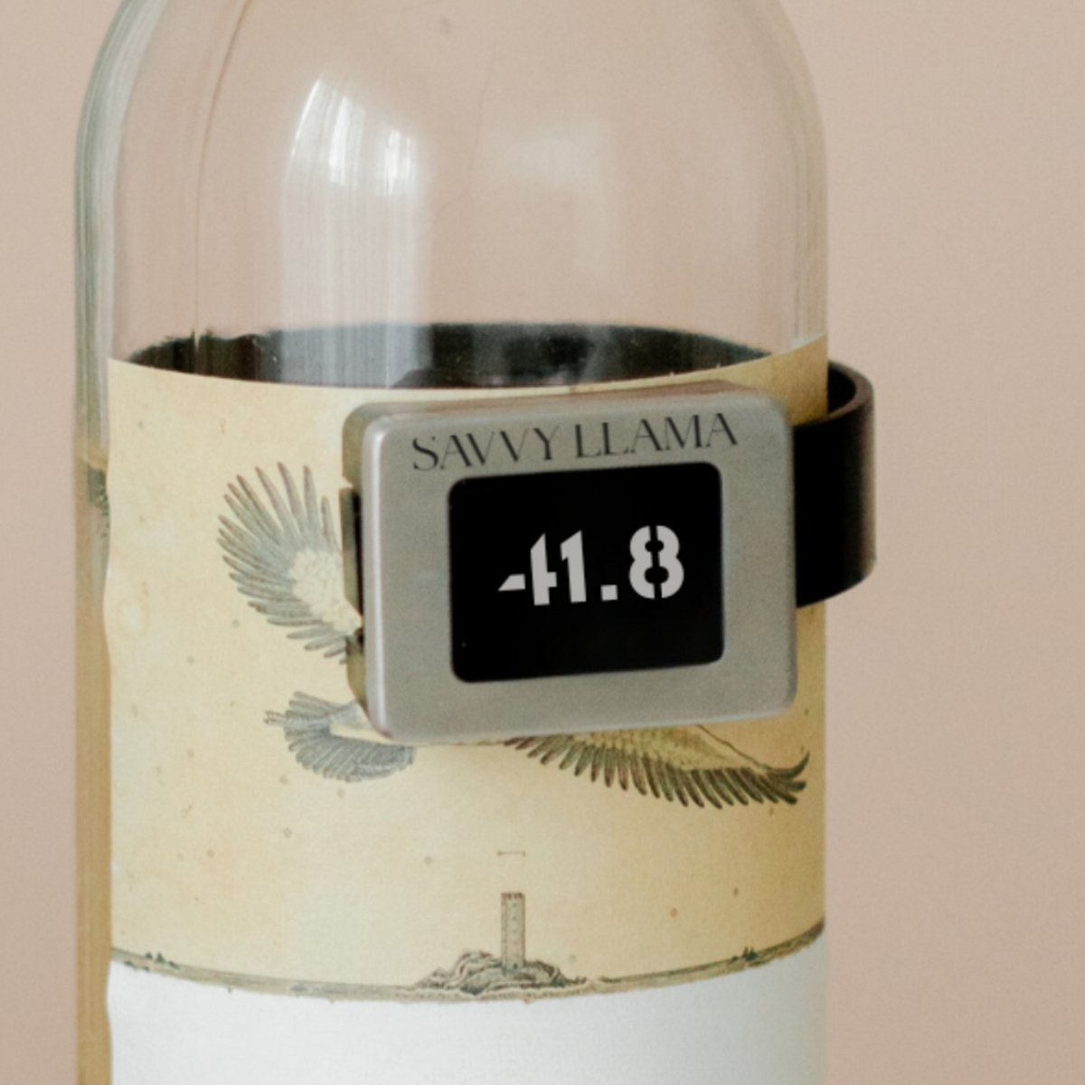 Savvy Llama digital on the bottle Thermometer clipped to a white wine bottle reading wine temperature. Part of the Savvy Llama wine enthusiast starter kit