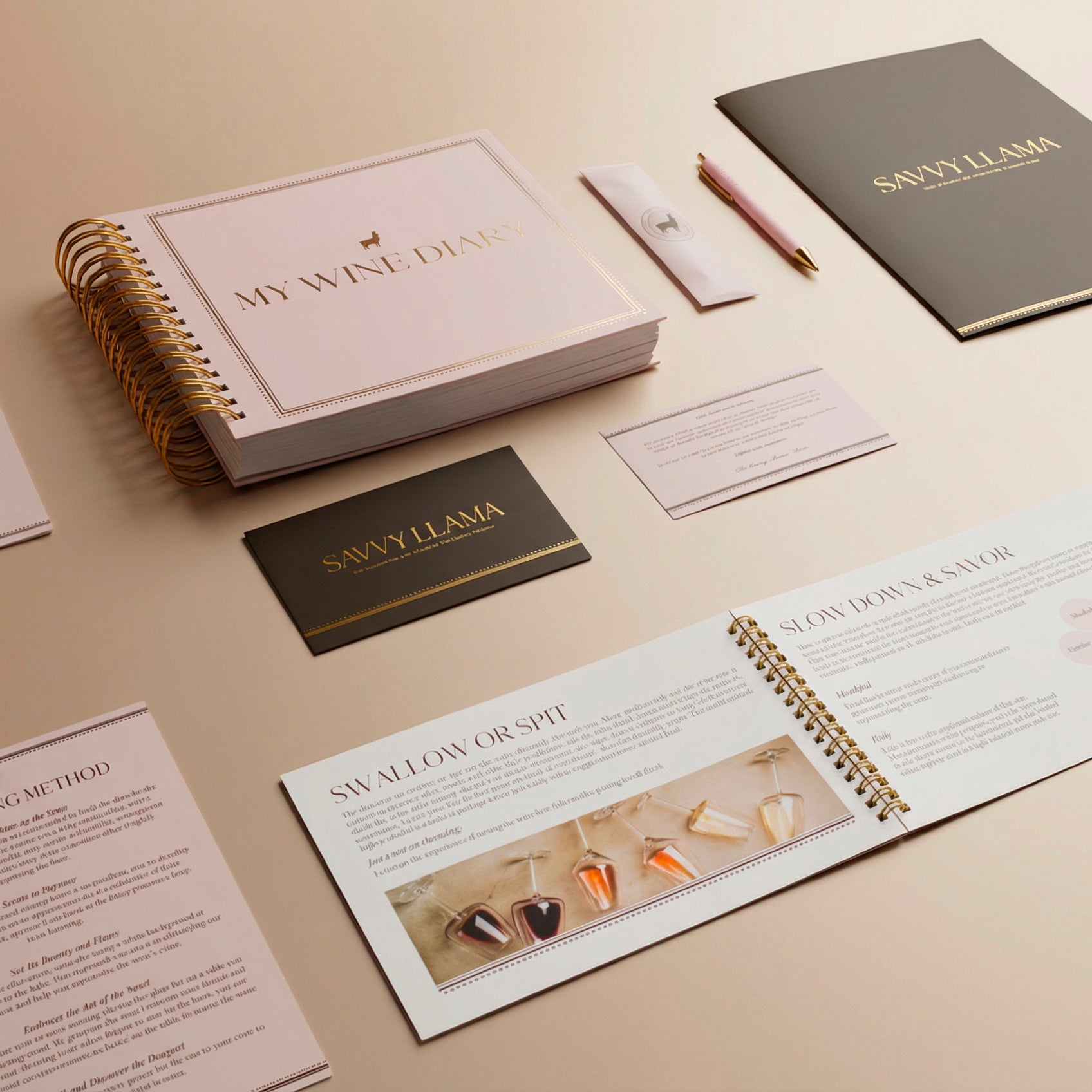 Flat lay of the Savvy Llama wine tasting kit contents on a peach background, a specially crafted wine education gift for women who want to build real wine confidence with wine diary, pink pen, education booklet, custom tasting method.  